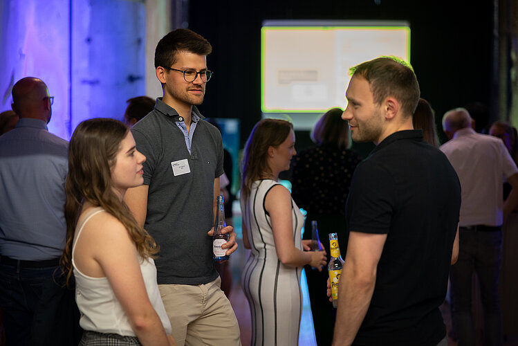 Group of young people networking.